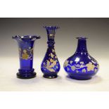 Continental blue glass carafe and two similar vases