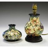 Moorcroft Hellebore pattern vase together with a similar lamp base