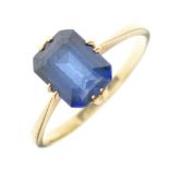 '18ct' yellow metal and synthetic sapphire ring,