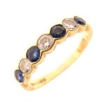 18ct gold half hoop ring, set with four sapphire and three brilliant cut diamonds