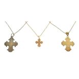 Three cross pendants