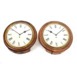 Two oak-framed wall clocks