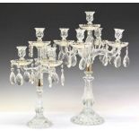 Two large glass candelabra