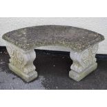 Composite stone curved garden seat having decorative supports