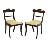 Pair of Regency sabre leg chairs