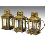 Set of three brass cargo lamps