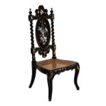 Victorian ebonised cane seat chair