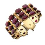 Silver-gilt bracelet of three rows of oval faceted rubies