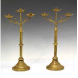 Pair of Ecclesiastical style brass candelabra