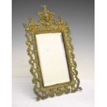 Small cast brass wall mirror