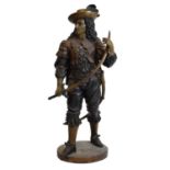 Large cast brass figure of a 16th or 17th Century gentleman