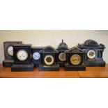 Seven assorted French black slate mantel clocks