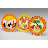 Three Wedgwood/Bradford Exchange Clarice Cliff plates