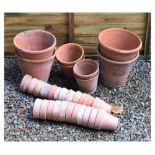 Quantity of small terracotta flower pots