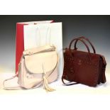 Radley - Two lady's handbags, both having pink Radley outer dust bags