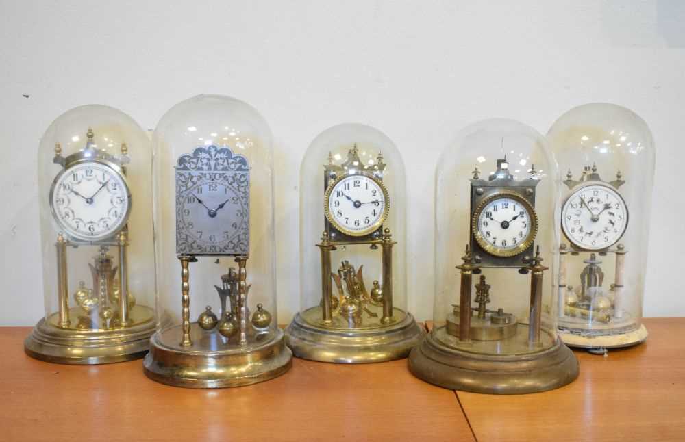 Five assorted torsion or anniversary clocks