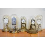 Five assorted torsion or anniversary clocks