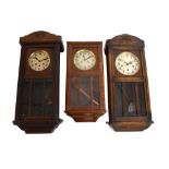 Three early 20th Century oak wall clocks