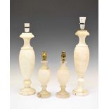Two pairs of white onyx lamp bases
