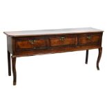 George III oak low dresser on cabriole supports