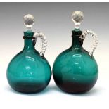 Pair of green glass carafes