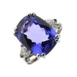 Tanzanite and diamond three-stone ring