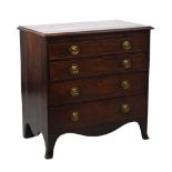 Late George III mahogany chest of drawers with brushing slide