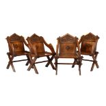 Set of four craftsman-made carved oak 'Glastonbury' chairs