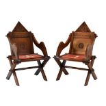 Pair of Glastonbury type carved oak hall chairs