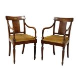 Pair of 19th Century Biedermeier brass-inlaid mahogany elbow chairs