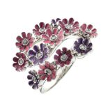 Diamond kinetic enamel flowerhead ring,