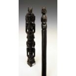 African staff, with figured grip, 102cm long, together with an African/ tribal style figure