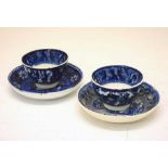 Pair of early 19th Century blue and white transfer printed tea bowls and saucers
