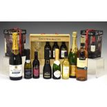 Two bottles of Champagne, together with a quantity of quarter bottles, box sets etc