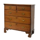 George III oak chest of two short and three long drawers