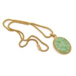 Jade floral motif pendant weight 46,4 gr.