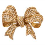 18kt yellow gold and diamond ribbon brooch weight 57,7 gr.