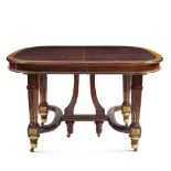 Mahogany and satinwood dining table France, 19th century 75,5x118x111 cm.