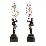 Pair of lacquered and gilt wood sculptures Italy, 19th century 250x50x50 cm.