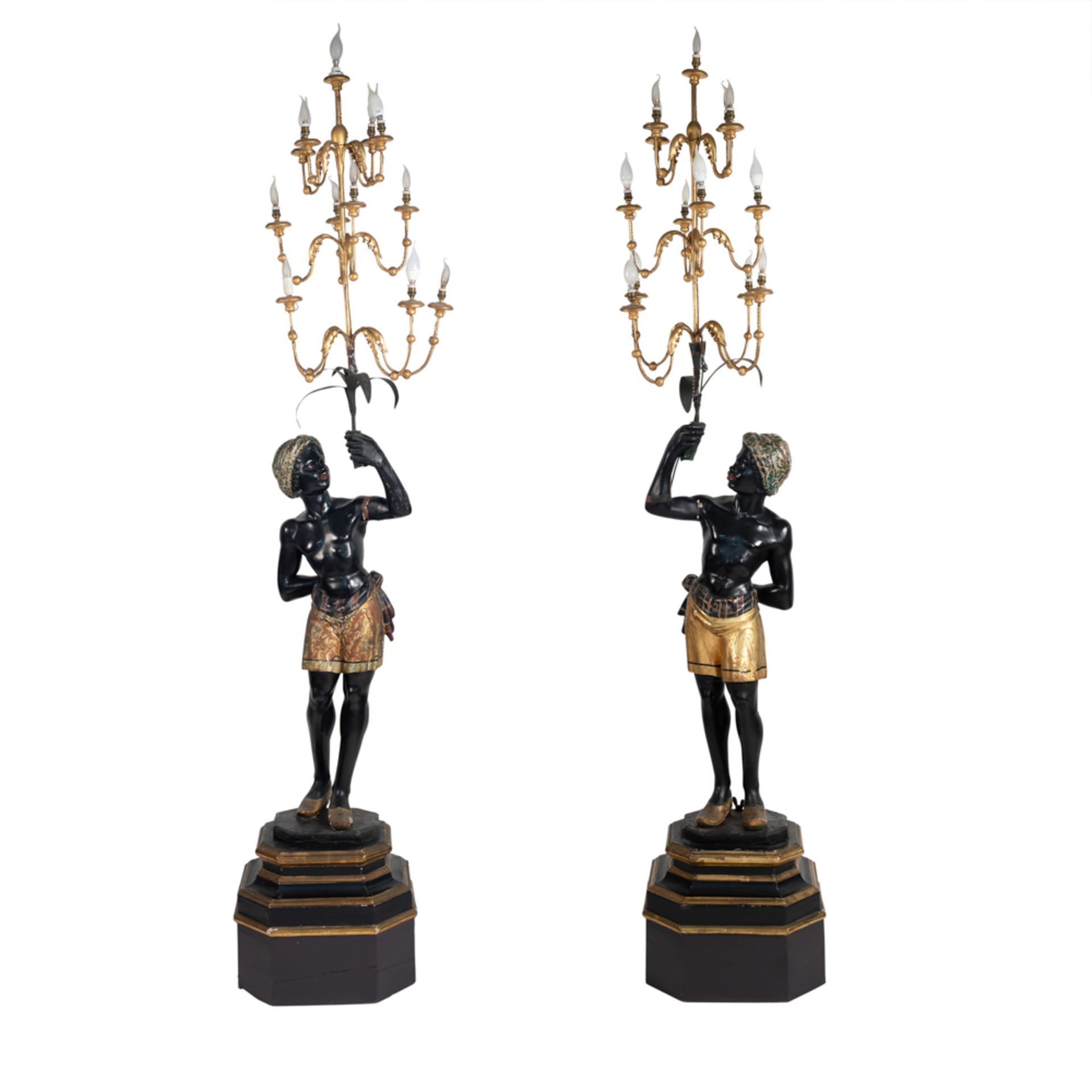 Pair of lacquered and gilt wood sculptures Italy, 19th century 250x50x50 cm.