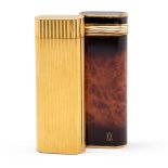 Cartier, two lighters France, 20th century h. 7 cm