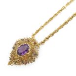 18kt yellow gold sculpture pendant and brooch with large amethyst