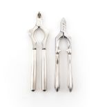 Two metal and silver champagne tongs