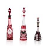 Group of transparent and colored cut crystal bottles (3)