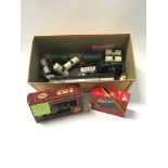 Collection of OO gauge rolling stock to include Hornby Esso petrol tank, Wakefield Castro?s Motor