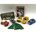 Scalextric lot to include 2 Mini?s C.122, motorbike and sidecar C281-2, catalogue and track supports