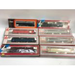 8 boxed Lima OO gauge wagons. Generally Good condition.