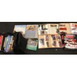 Bag of model railway books and photo albums.