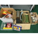 A large collection of OO gauge model railway accessories, mainly buildings.