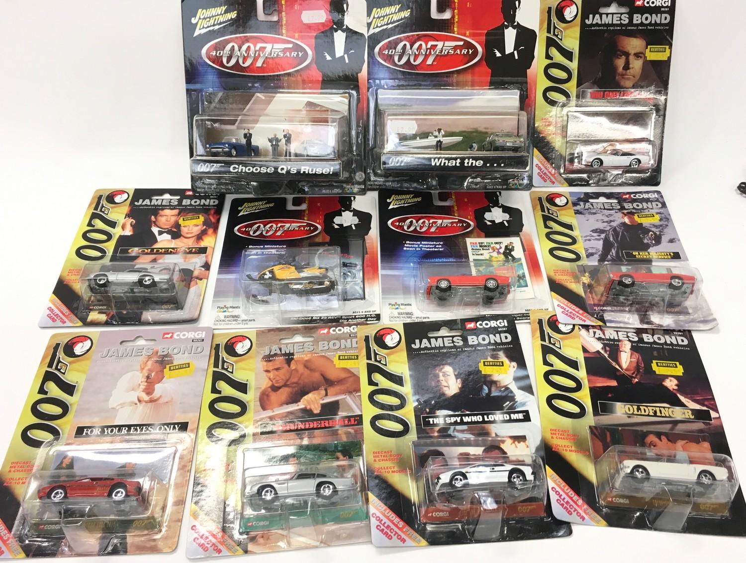 Collection of James Bond related diecast model vehicles in bubble packs by Corgi and Johnny